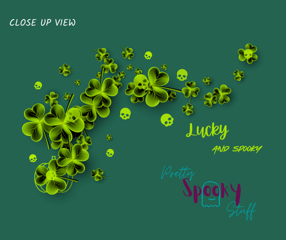 St. Patrick's Day shirt design closeup with green clovers and green skulls around them and on top of them with the words "lucky and spooky" below.