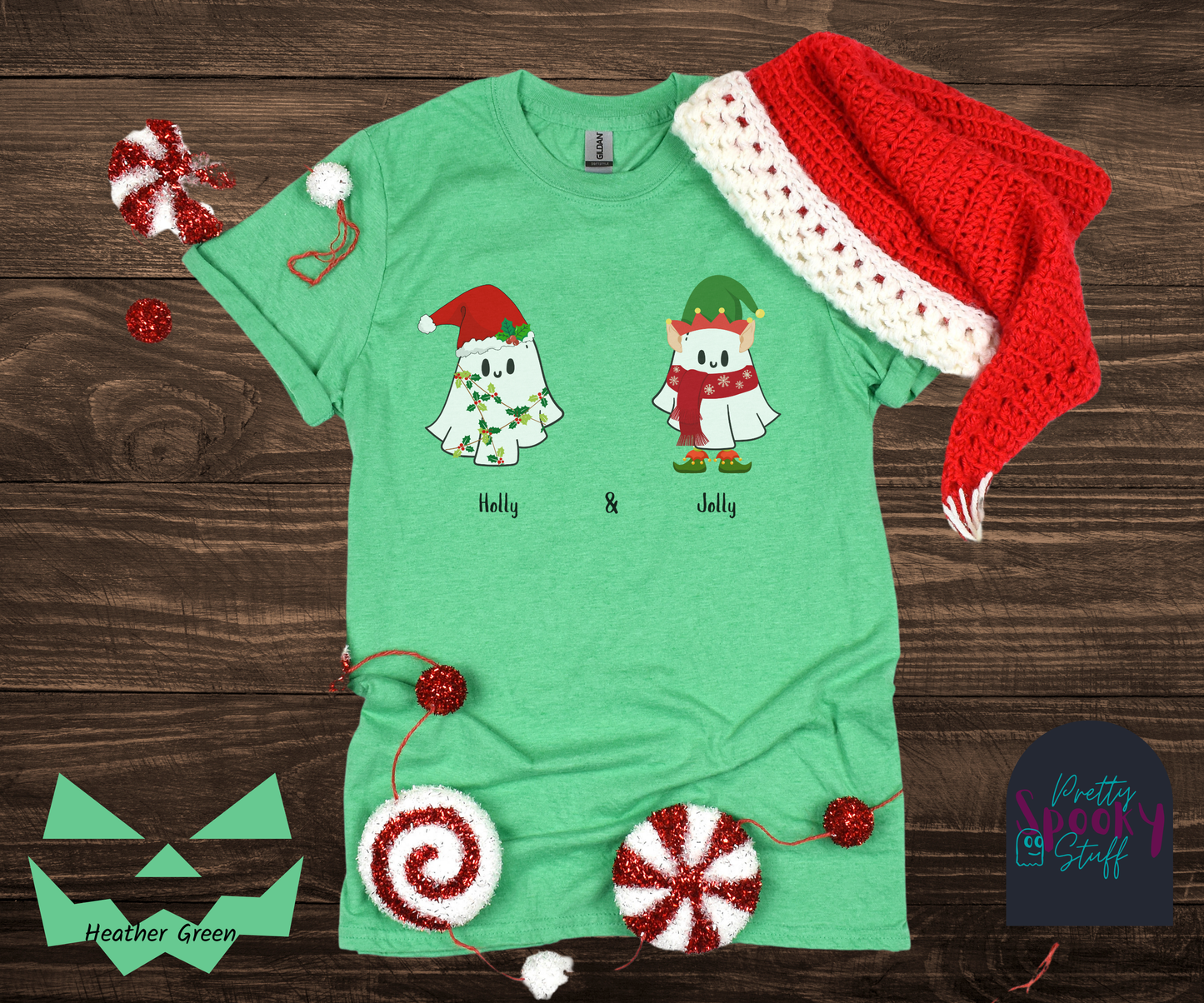 Christmas shirt with two ghosts, one wearing elf garb named Jolly, and one wearing a Santa hat and covered in holly leaves named Holly, in heather green.