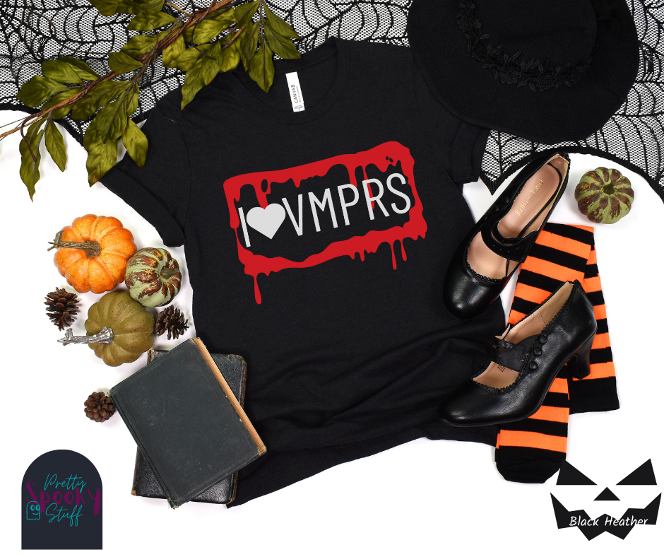 Vampire Halloween shirt featuring a bloody, dripping rectangle with the letters "I<3VMPRS" in uppercase white font, resembling a license plate, in black heather.