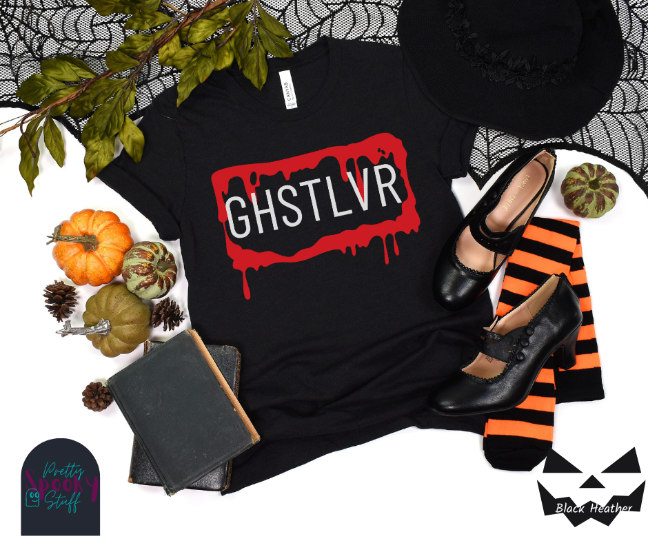 Ghost Halloween shirt featuring a bloody, dripping rectangle with the letters "GHSTLVR" in uppercase white font, resembling a license plate, in black heather.