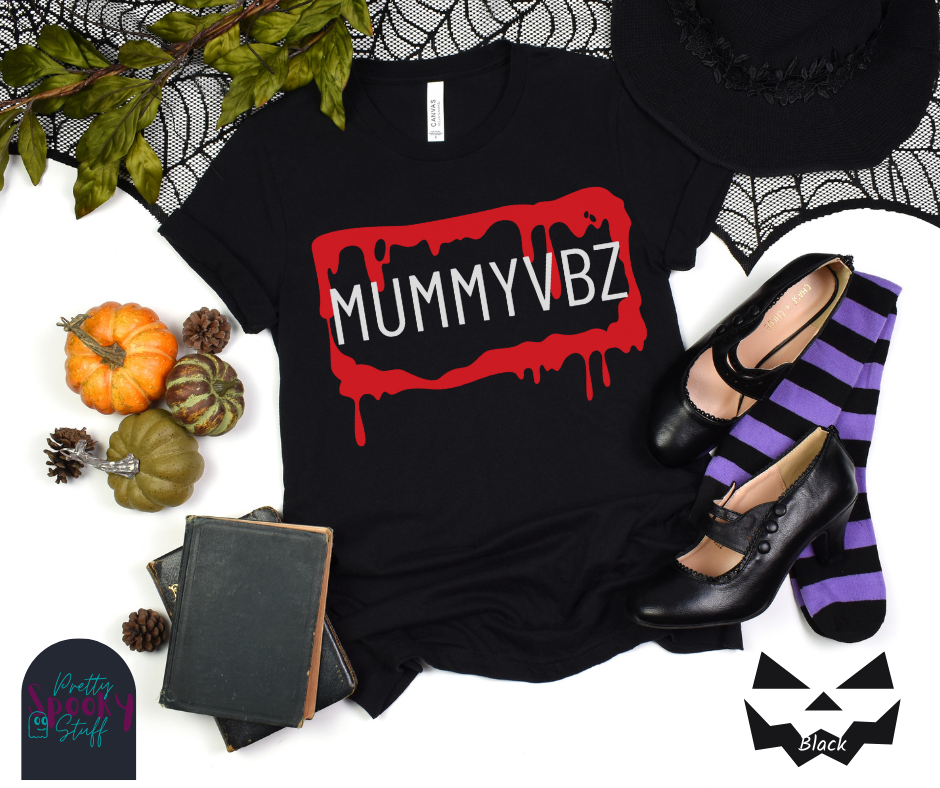 Mummy Halloween shirt featuring a bloody, dripping rectangle with the letters "MUMMYVBZ" in uppercase white font, resembling a license plate, in black.