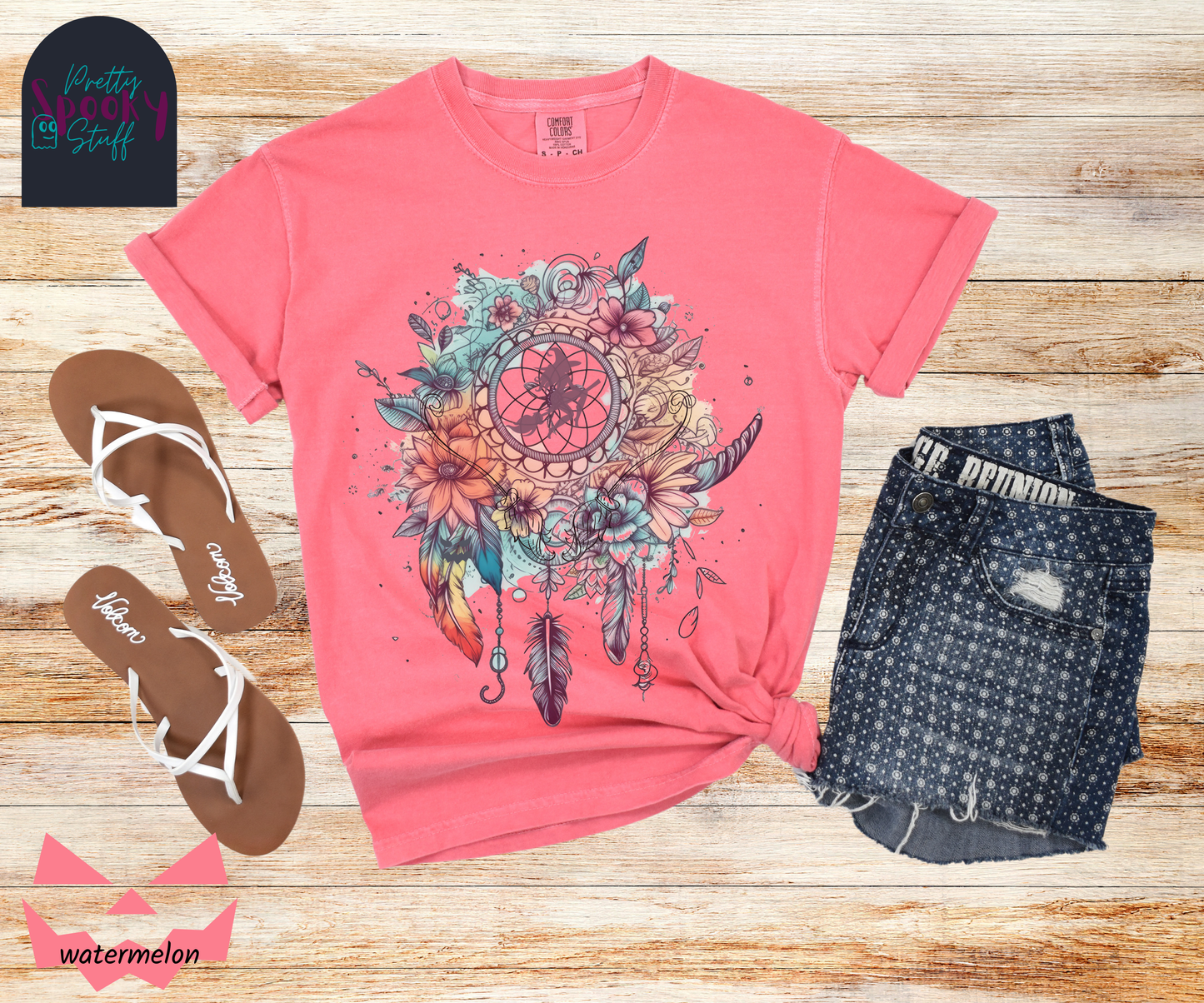 Halloween floral witch dreamcatcher shirt, watercolor aesthetic in blues and pinks, with purple silhouette of witch flying on her broom in the main circle, with witch broom line drawings hidden amongst the flowers, in watermelon.