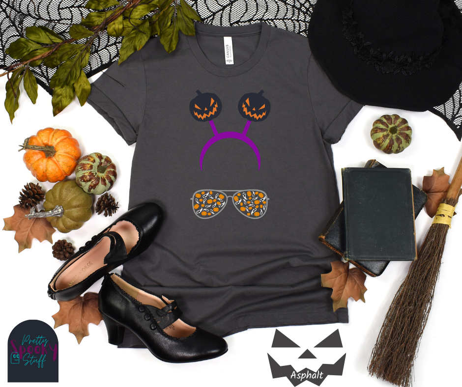 Aviators Halloween shirt with purple headband with creepy jack o' lanterns springing from the top, and aviator glasses with small pumpkins and ghosts filling the lenses, in asphalt.