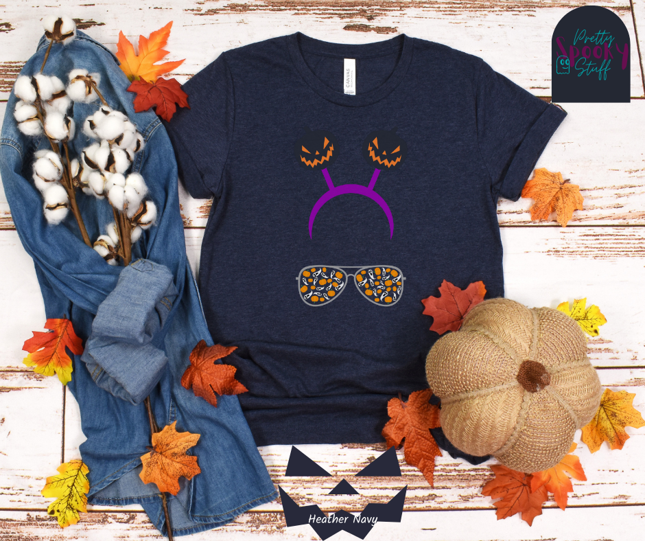 Aviators Halloween shirt with purple headband with creepy jack o' lanterns springing from the top, and aviator glasses with small pumpkins and ghosts filling the lenses, in heather navy.