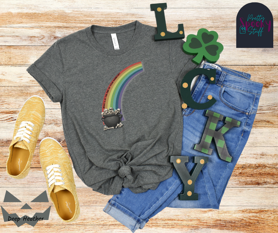 St. Patrick's Day shirt with a half rainbow coming out of a cauldron filled with bones, with the words "what's at the end of your rainbow" following the curve of the red line, in deep heather.