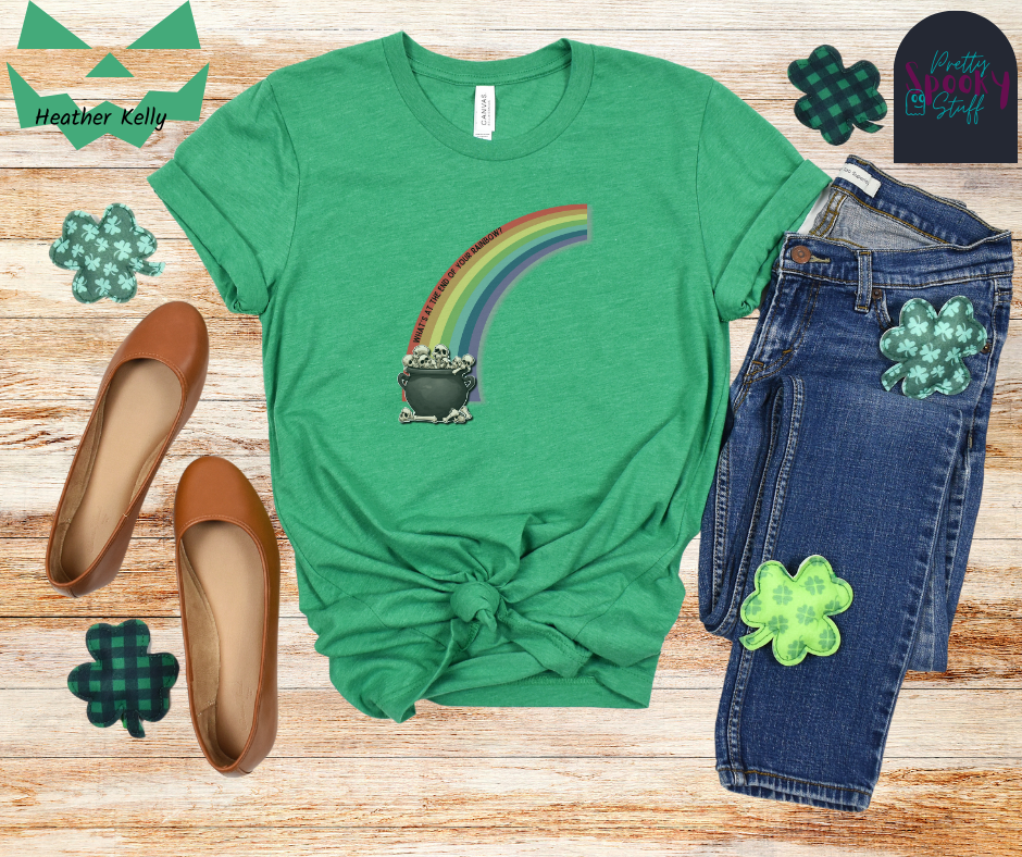 St. Patrick's Day shirt with a half rainbow coming out of a cauldron filled with bones, with the words "what's at the end of your rainbow" following the curve of the red line, in heather kelly.
