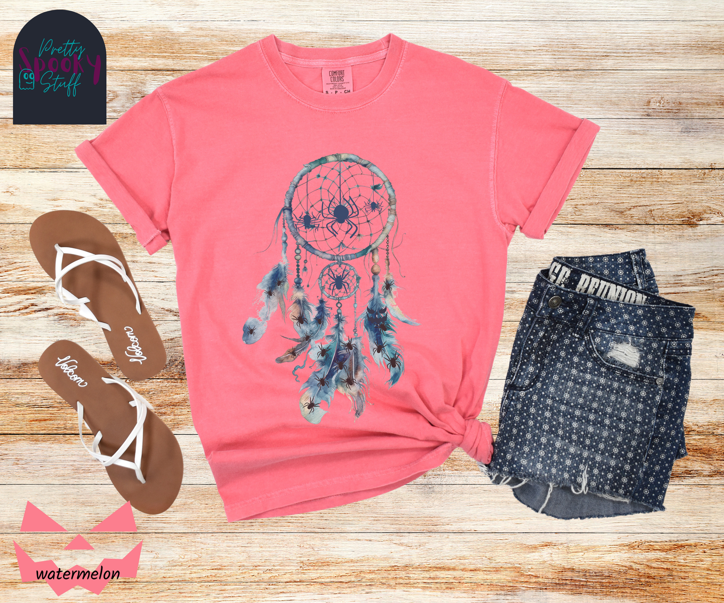 Halloween spider dreamcatcher shirt, watercolor aesthetic in shades of blue, a few spiders hanging in the main circle, several other spiders hiding in the multiple feathers hanging below, in watermelon.