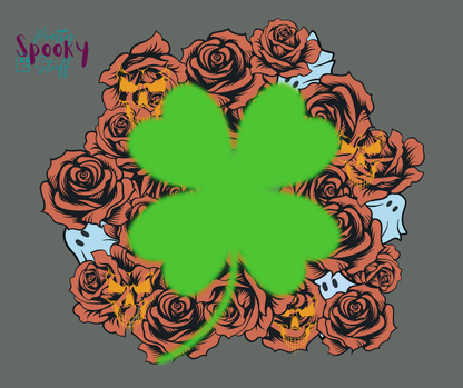 St. Patrick's Day shirt close-up with four-leaf clover, mauve roses, and hidden ghosts and skull faces.