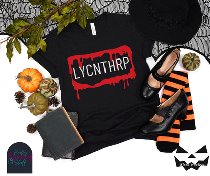 Werewolf Halloween shirt featuring a bloody, dripping rectangle with the letters "LYCNTHRP" in uppercase white font, resembling a license plate, in black heather.