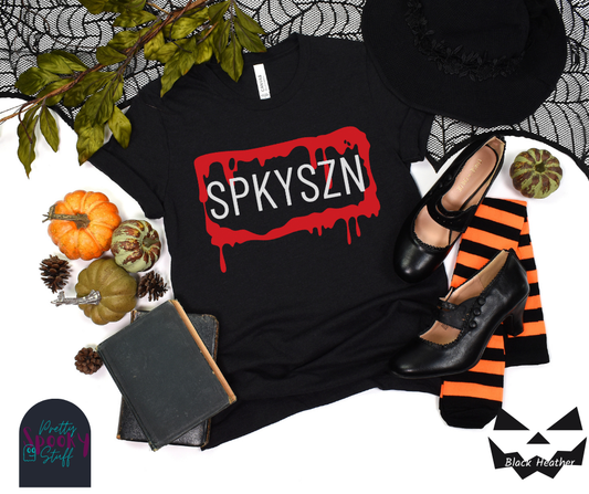 Halloween shirt featuring a bloody, dripping rectangle with the letters "SPKYSZN" in uppercase white font, resembling a license plate, in black heather.