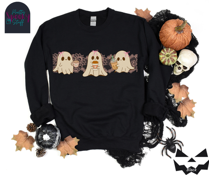 Coquette Halloween sweatshirt with three adorable ghosts, each enjoying their own coffee beverage, adorned with a pink bow, with light pink intricate lace design behind them, in black.