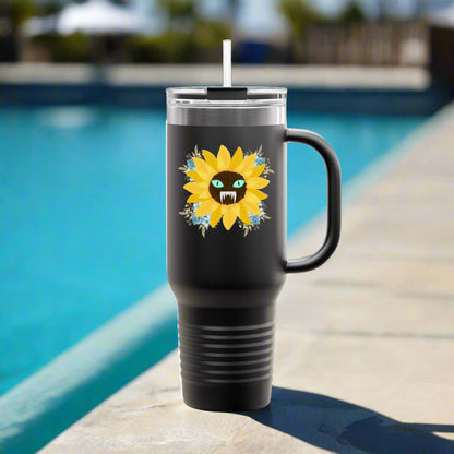 Spooky Girl Summer 40oz tumbler design featuring a sunflower with a menacing face in the middle(striking blue eyes and sharp teeth), with light blue florals in each corner, black background. Sitting by the pool.
