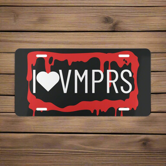 Werewolf Halloween vanity plate featuring a bloody, dripping rectangle with the letters "I<3VMPRS" in uppercase white font, resembling a license plate.