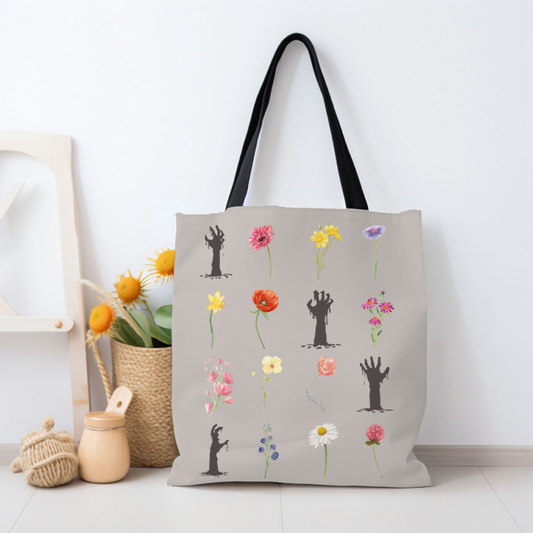 Spooky Girl Summer polyester totebag featuring different floral stems with creepy zombie arms arranged in 4x4 grid, on gray backround.